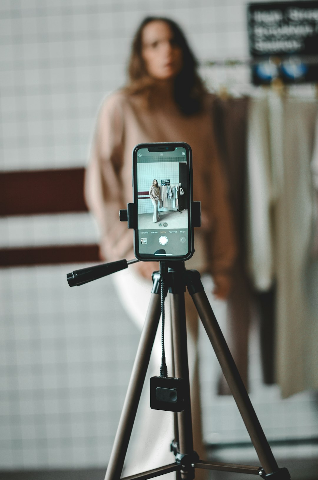 Creator during a studio content session. Placeholder image for creator and influencer campaign work. Photo by Roman Manshin on Unsplash.